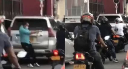 VIDEO: rateros intentan asaltar a conductor desde una moto y los recibe con una lluvia de balas